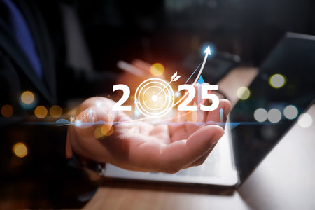 Growth 2025 goal and development chart of company to success future. Planning,opportunity, challenge and business strategy in new year 2025. Businessman hand and Economic graphの写真素材