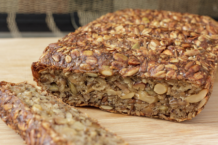 Vegan nut loaf on cutting boardの写真素材