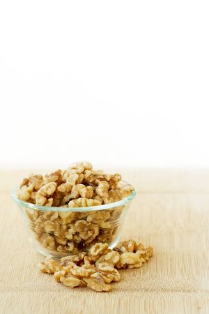 walnuts in glass bowl.の写真素材