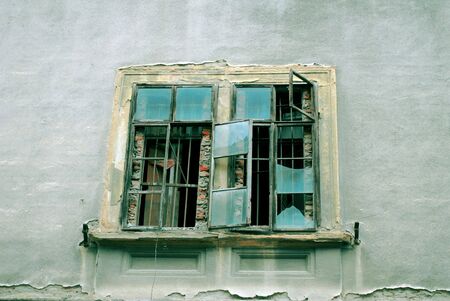 age old building in Timisoara detail of ruined windowの写真素材