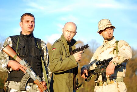 three kind of soldiers posing military movie poster like