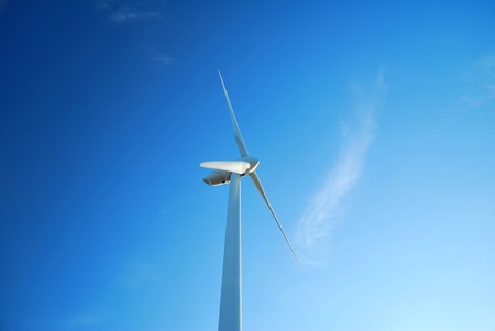 Windmill in Romania gathers energy from the summer breeze.