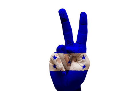 grunge flag painted hand making the V sign isolated over white backgroundの写真素材
