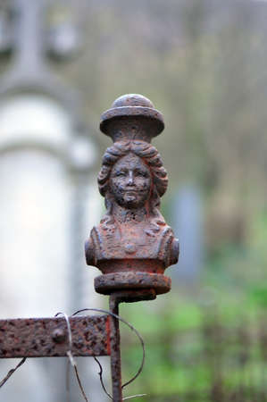 old cemetery rusted iron fence decoration detailの写真素材