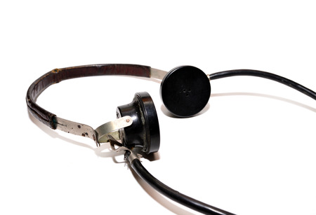 vintage telephonist headphones old phone over white