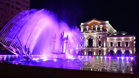 DROBETA TURNU SEVERIN, ROMANIA - 06.21.2016:  city theater and water fountain landmark architecture