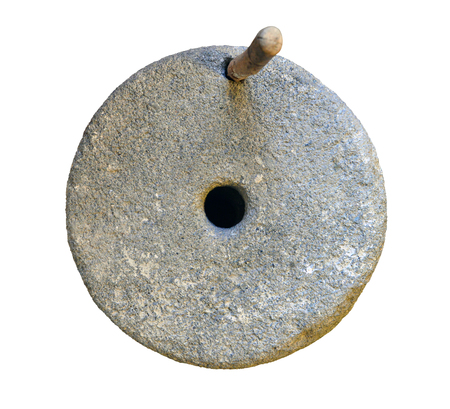 ancient mill stone isolated over white background