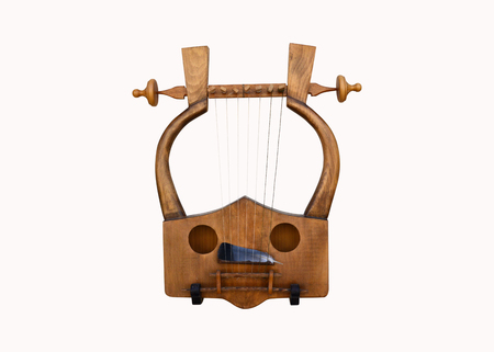 Greek musical instrument lyra isolated over whiteの写真素材