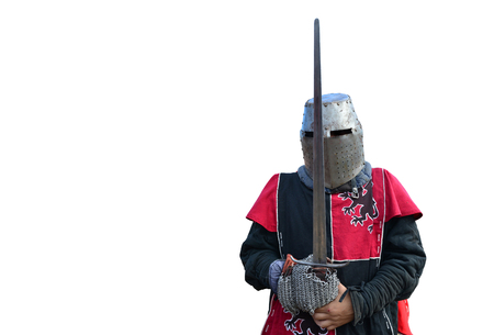 medieval metal armor and helmet knight isolated over whiteの写真素材