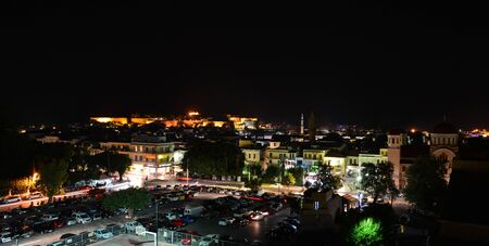 RETHYMNO, GREECE - 08.04.2016: night view over city street with people editorialのeditorial素材