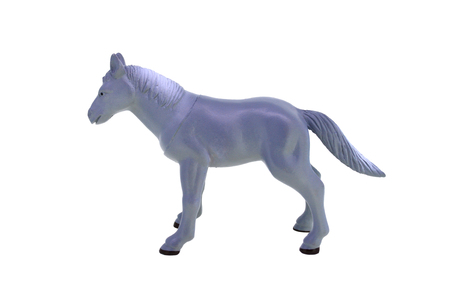 Plastic toy horse isolated over whiteの写真素材