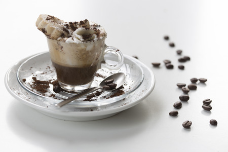 coffee with cream and biscuitの写真素材