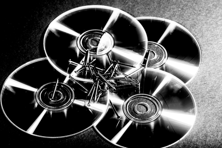 cd and spikesの写真素材