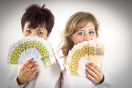 partners shows banknotes earnedの写真素材