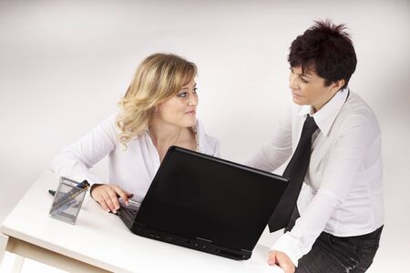 partners work with the computer in the officeの写真素材