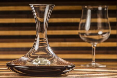 decanter and glass with red wine