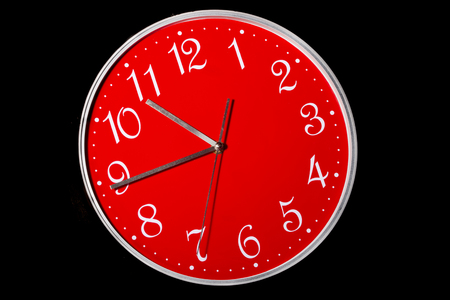 red watch on a black backgroundの写真素材