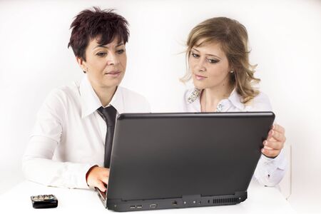 partners work with the computer in the officeの写真素材