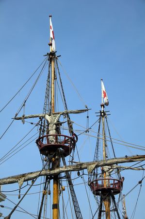 The Golden Hinde is docked at the side of the River Thames. It is a full sized exact replica of Sir Francis Drake's 16th Century warship which he use to circumnavigate the world along with a little piracy on the way.の写真素材