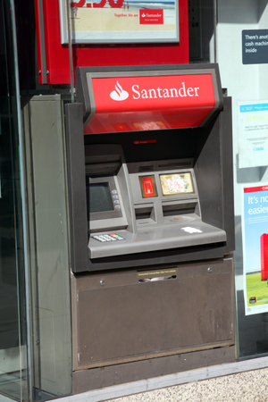 London, United Kingdom, Apr 9, 2011 : A Santander Bank cash machine at one of its branches in the City Of Londonのeditorial素材