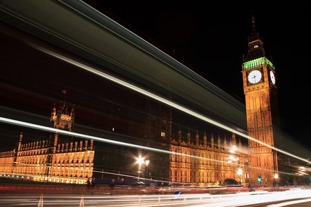 Big Ben and The Houses Of Parliament in London's Westminster England, UK, at night with blurred motion, traffic tail lights and headlightsの写真素材