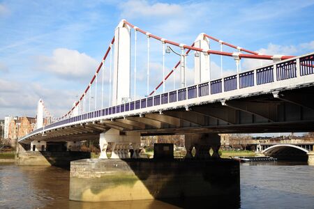 Chelsea Bridge across the River Thames connecting Chelsea to Battersea, London , England, UKの写真素材