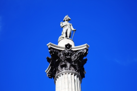 Nelsons Column rises to nearly 185 feet in the centre of Trafalgar Square, London, England, UK, and was erected to celebrate Horatio Nelson s great victory at Trafalgar over Napoleon in 1805の写真素材