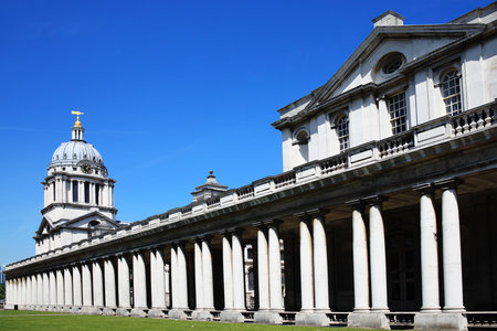 Designed by Sir Christopher Wren and built between 1696-1712 as Greenwich Hospital in Greenwich, England, UK, the Old Royal Naval College was established in 1873and stands opposite London s Docklandsのeditorial素材