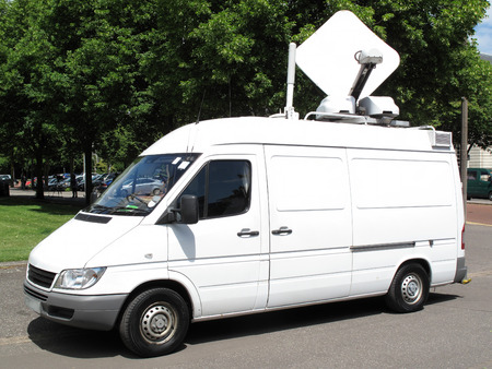 Outside broadcast white media vehicle vanの写真素材