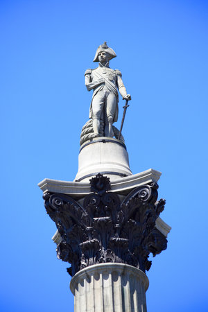 Nelson's Column rises to nearly 185 feet in the centre of Trafalgar Square, London, England, UKのeditorial素材
