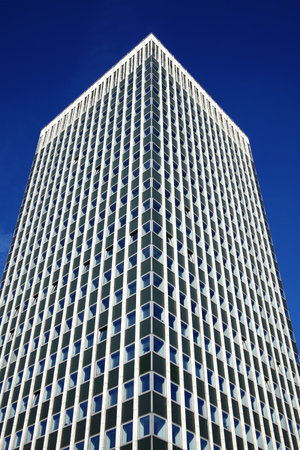 Modern futuristic tower block office skyscraper buildings architecture, with a clear blue sky in a downtown financial business district in England, UKのeditorial素材