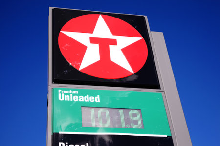 Mumbles, Wales, UK, February 23, 2016 :  A  Texaco petrol station sign on the Mumbles Road, Swansea bay, showing its company logo and pricesのeditorial素材