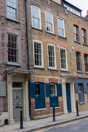 London, UK, July 1, 2012 : Georgian terraced town house in Spitafields once the home of a wealthy...