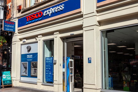 Cardiff, Wales, UK, September 14, 2016 : Tesco Express supermarket logo advertising sign at a retail...
