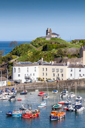 Tenby, Wales, UK , May 14, 2018 : Tenby Harbour which is a popular seaside resort town in Pembrokeshire and a popular travel destination tourist attraction landmark, stock photo imageのeditorial素材