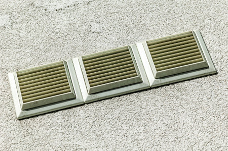 Heating and cooling air vent  on the exterior wall of a house for a good airflow ventilation, stock photo imageの写真素材