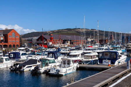 Swansea, Wales, March 31, 2017 : Swansea Marina which is a popular seaside travel resort destination for boats and yachts on the Welsh coastline, stock photo imageのeditorial素材