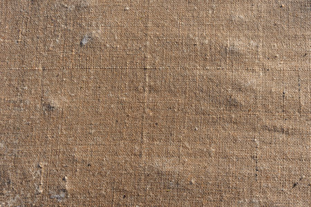 Brown hessian linen texture or background which could be used as an artist canvas for blending images stock photoの写真素材