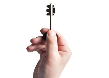 hand holding a key white isolated