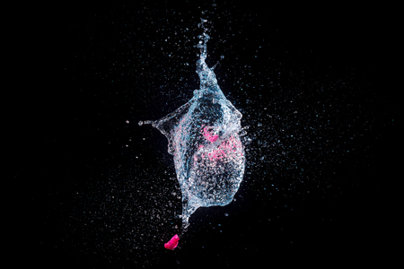 amazing explosion of isolated water balloonの写真素材
