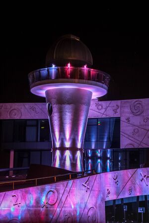 RUSSIA, YAROSLAVL - 22 AUG. 2012: Night city landscape planetarium Tereshkova with multi-colored lighting and futuristic design shot at long exposure on tripod.のeditorial素材