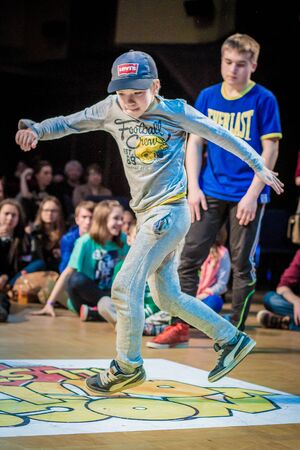 RUSSIA, YAROSLAVL -  16 MAR. 2014: Nogi v Ruki breakdance battle competition among group of teams kids, teenagers and adults hip-hop bboys.のeditorial素材