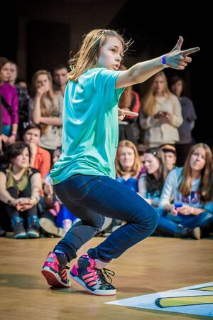 RUSSIA, YAROSLAVL -  16 MAR. 2014: Nogi v Ruki breakdance battle competition among group of teams kids, teenagers and adults hip-hop bboys.のeditorial素材
