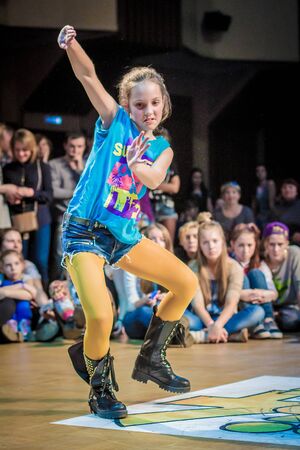 RUSSIA, YAROSLAVL -  16 MAR. 2014: Nogi v Ruki breakdance battle competition among group of teams kids, teenagers and adults hip-hop bboys.のeditorial素材