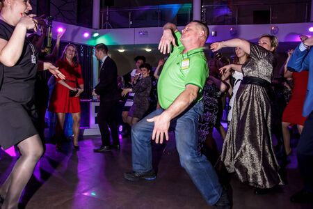 RUSSIA, YAROSLAVL -  27 DEC. 2016: Corporate party company Oriflame with leading and dancing on the occasion of the end of the year of sales and the new year, with a lot of people.のeditorial素材
