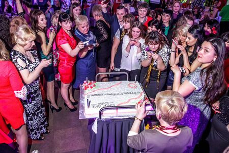 RUSSIA, YAROSLAVL -  27 DEC. 2016: Corporate party company Oriflame with leading and dancing on the occasion of the end of the year of sales and the new year, with a lot of people.のeditorial素材