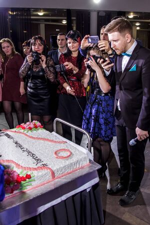 RUSSIA, YAROSLAVL -  27 DEC. 2016: Corporate party company Oriflame with leading and dancing on the occasion of the end of the year of sales and the new year, with a lot of people.のeditorial素材