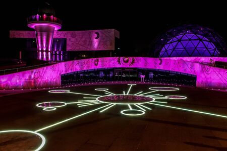 RUSSIA, YAROSLAVL - 22 AUG. 2012: Night city landscape planetarium Tereshkova with multi-colored lighting and futuristic design shot at long exposure on tripod.のeditorial素材