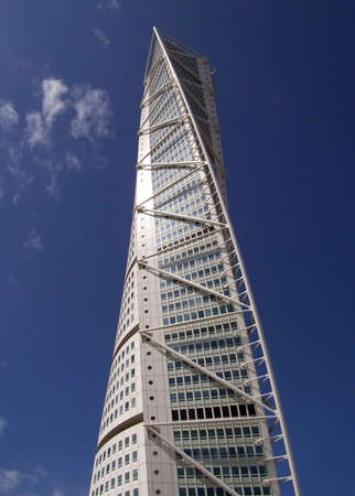 an upward view of the turning torso twisted tower block in malmo