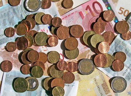 Collection of different euro bank notes and coinsの写真素材